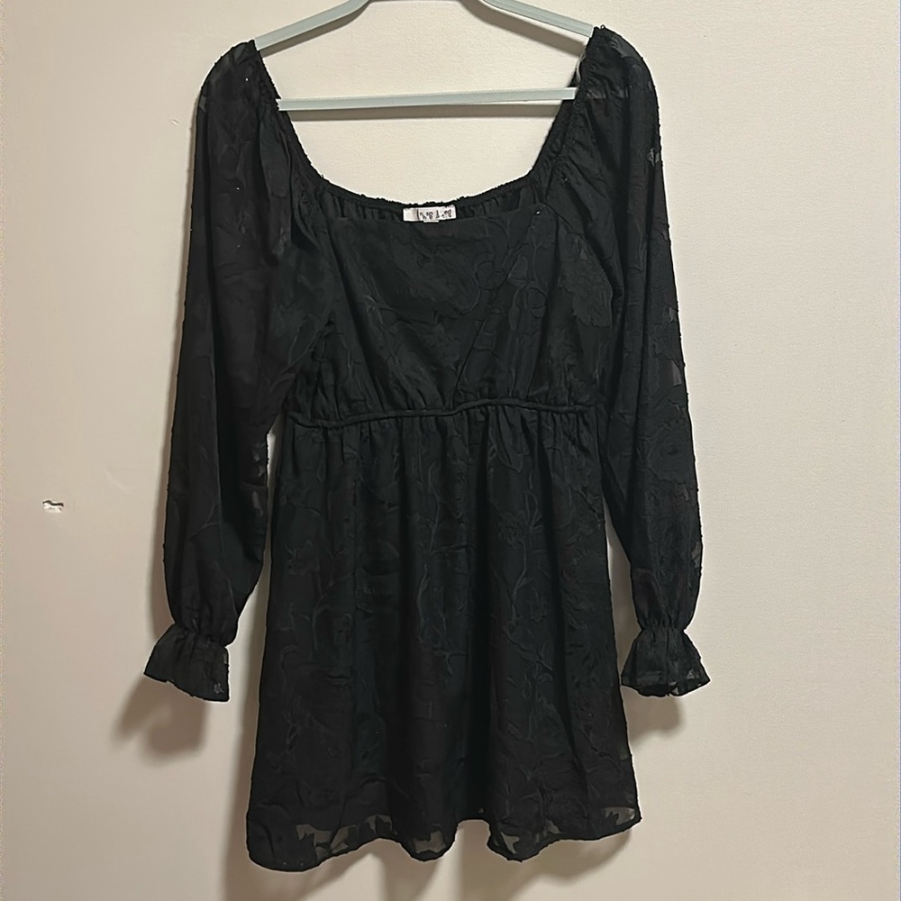 Black knee length long sleeve dress by Inspired Hearts, size medium